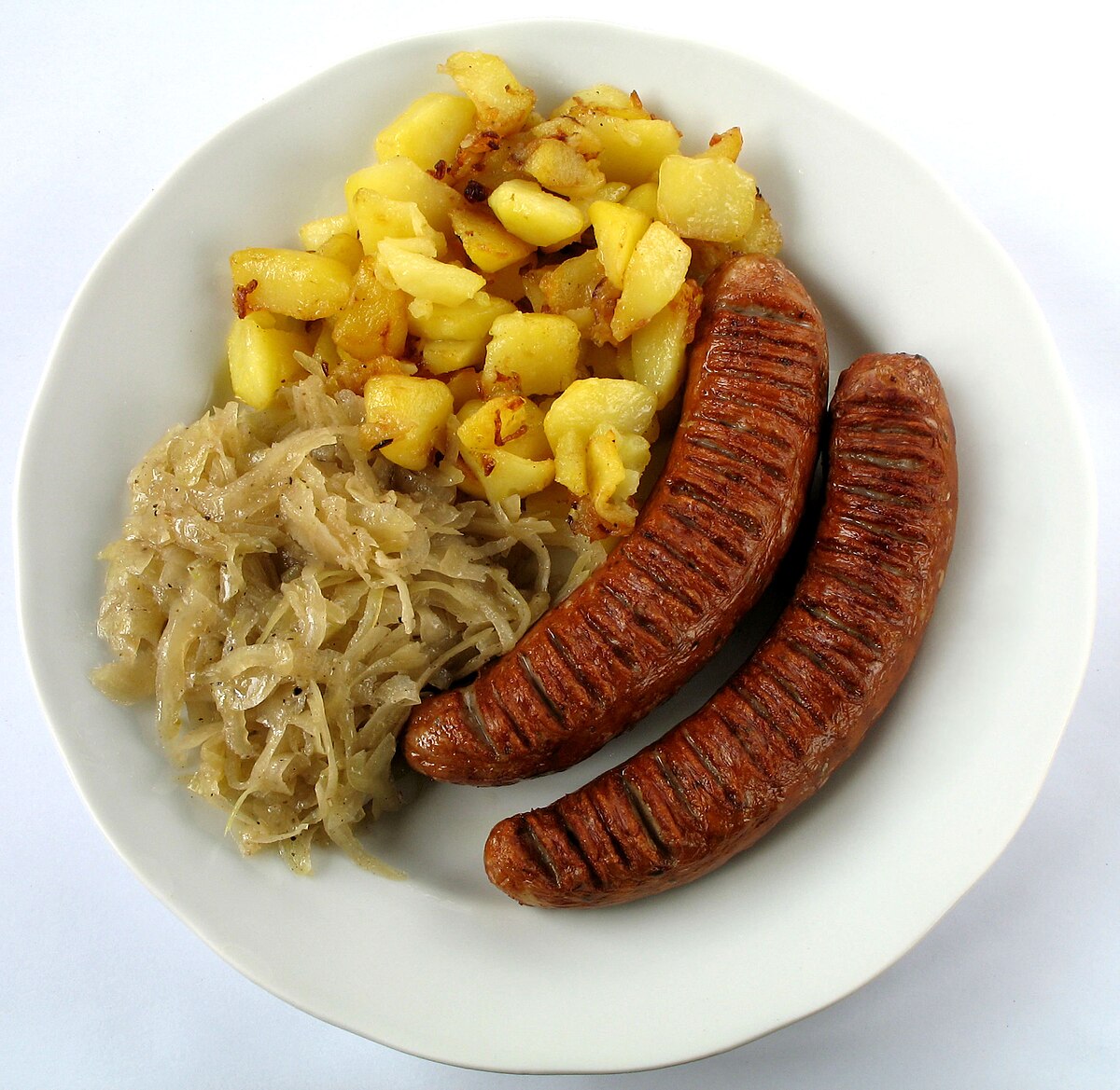 alt="Snacks de rue européens : Currywurst populaire en Allemagne"
